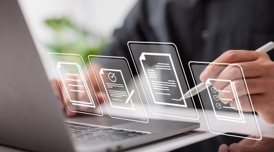 Businessman signs an electronic document on a digital document on a virtual notebook screen using a stylus pen.